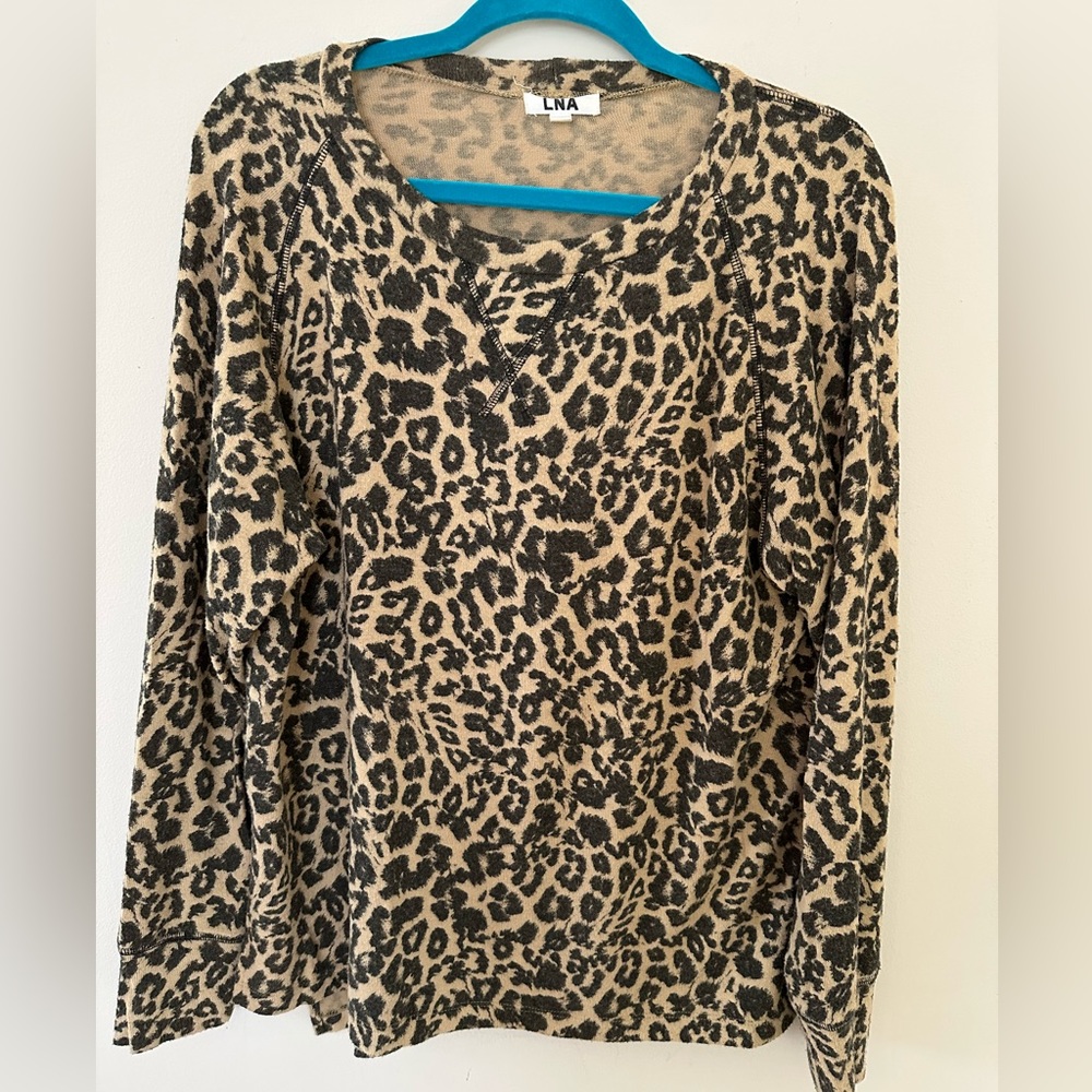 Softest sweater/sweatshirt you’ll ever own. Fabulous animal print.